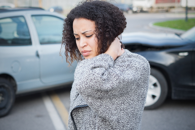 Woman with whiplash after a car accident 